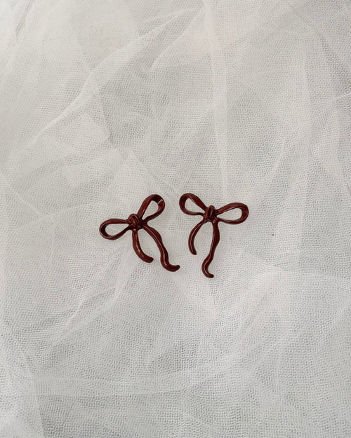 Aretes de moño rojo