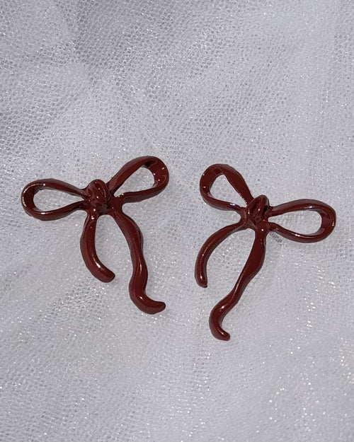 Aretes de moño rojo